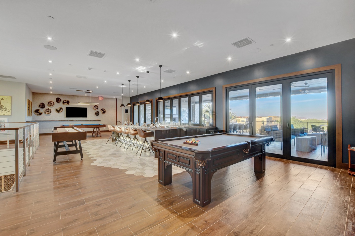 Game room with billiards and bar at The Outlook Club in Trilogy